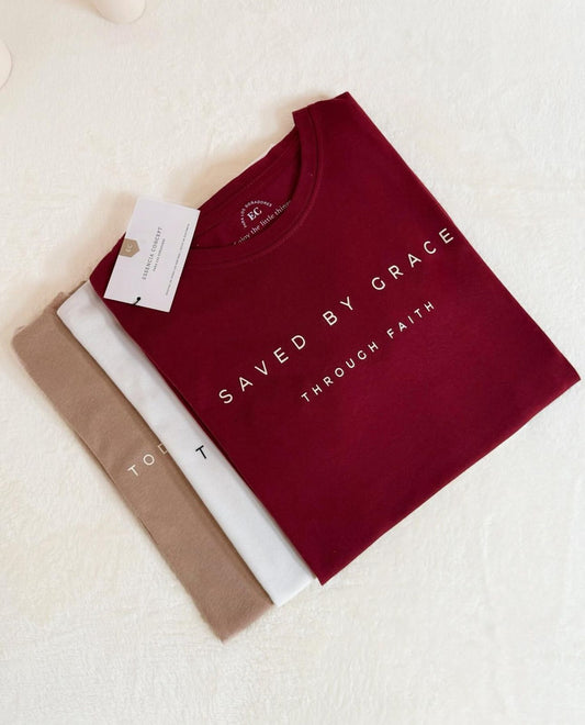“Saved by Grace”, Blusa tipo T-shirt de algodón.